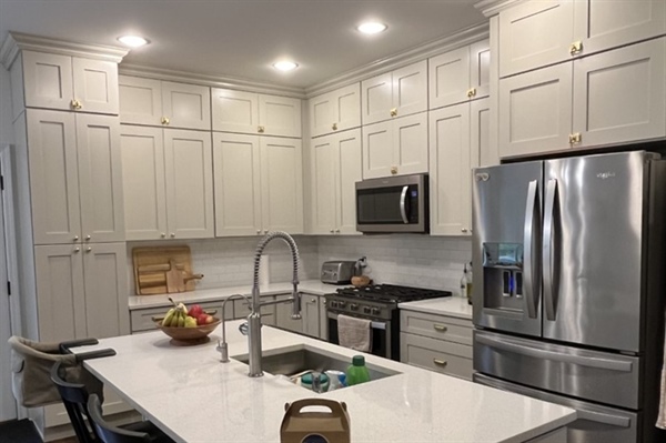 Why Is Spray Painting Better Than Brush Painting for Cabinets?