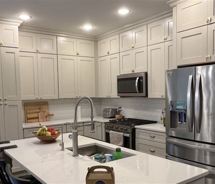 Why Is Spray Painting Better Than Brush Painting for Cabinets?