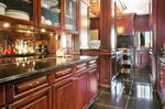 How Can Homeowners Maintain Restored Wood Surfaces for Decades?