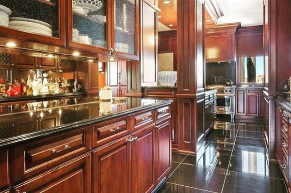 How Can Homeowners Maintain Restored Wood Surfaces for Decades?